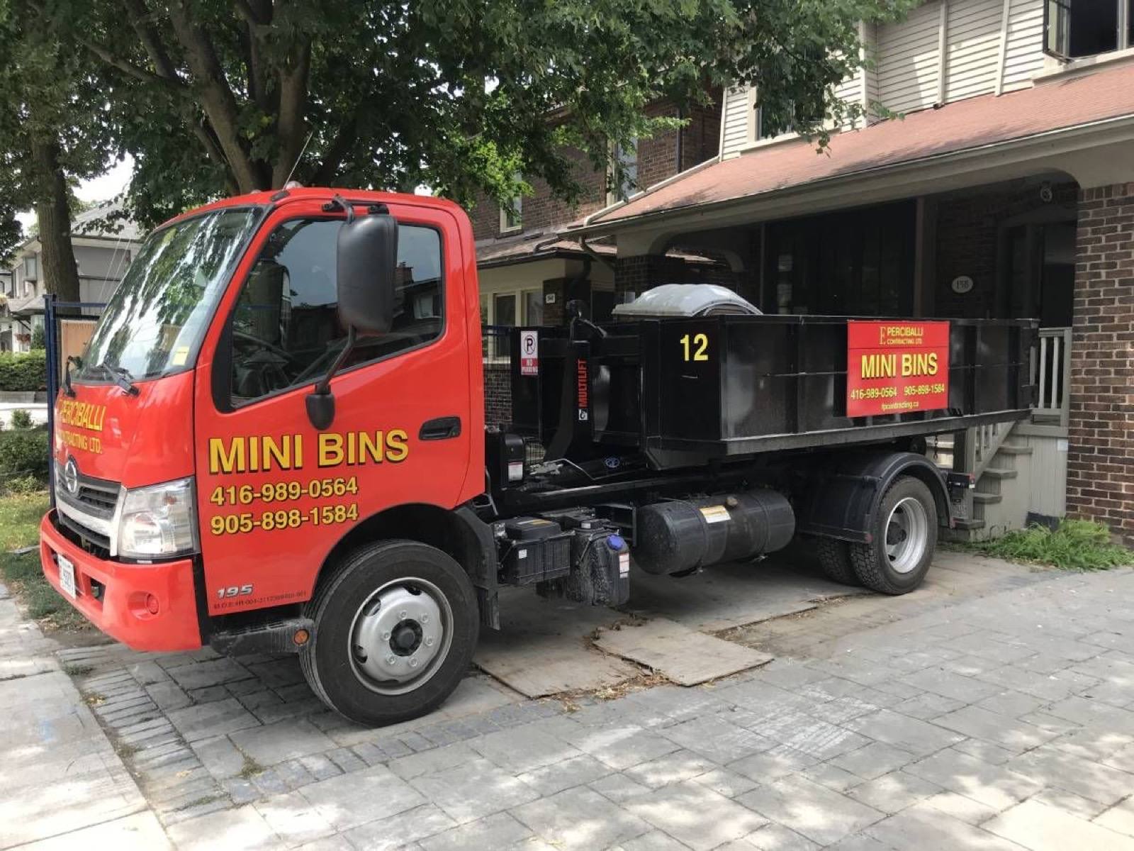 Mini disposal bin delivery truck
