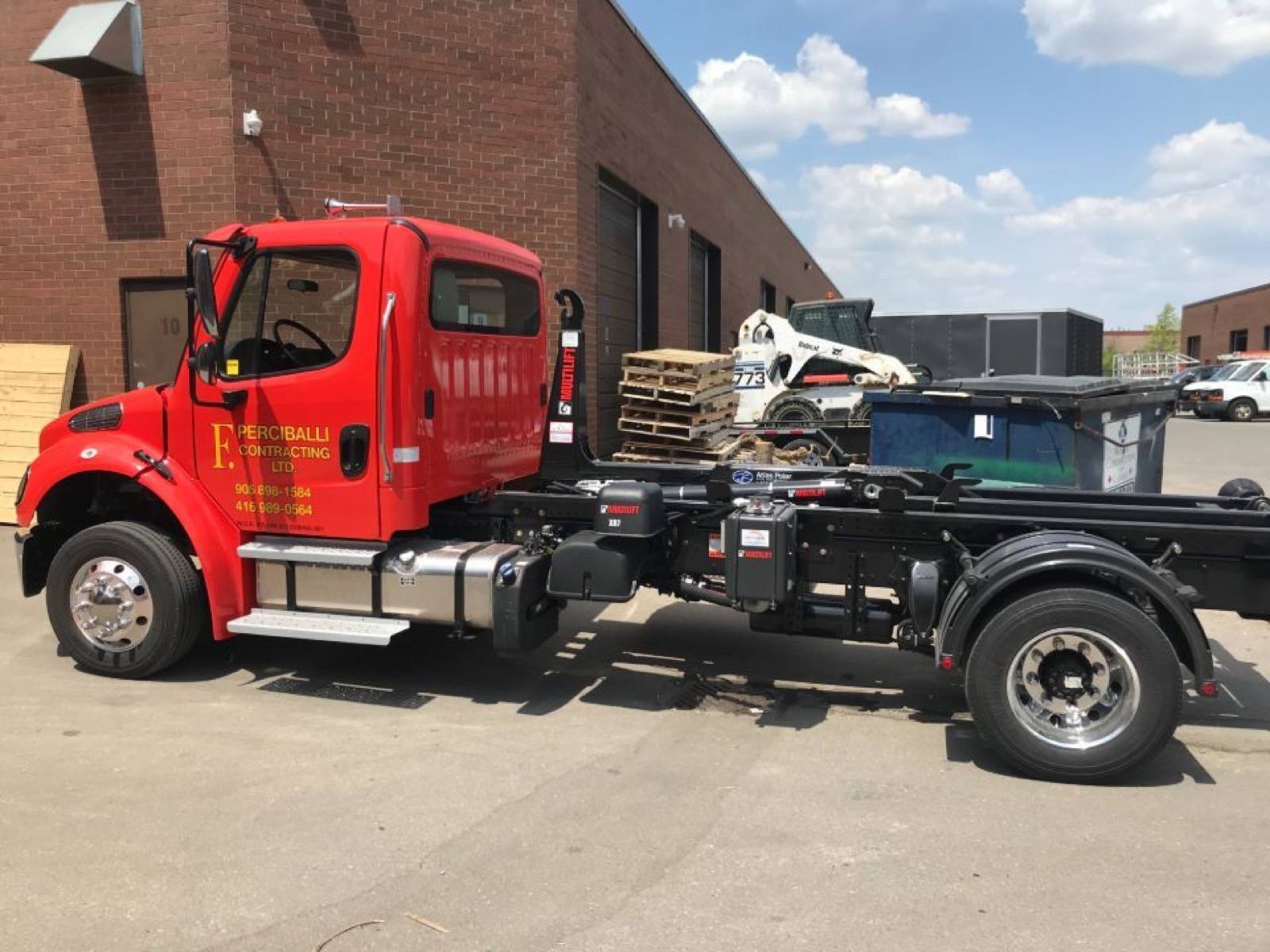 wide angle view of mini bin truck
