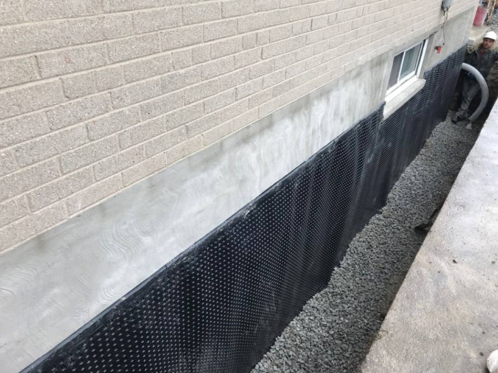 plastic cover attached to the house foundation 