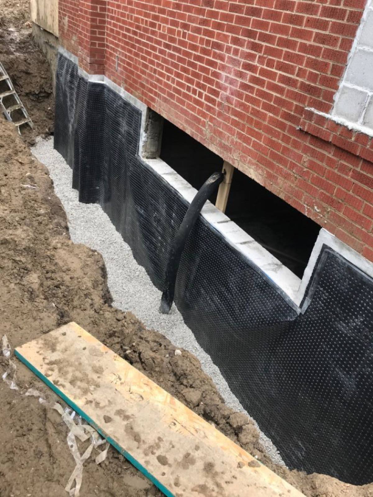 black pvc sheet covering the wall 