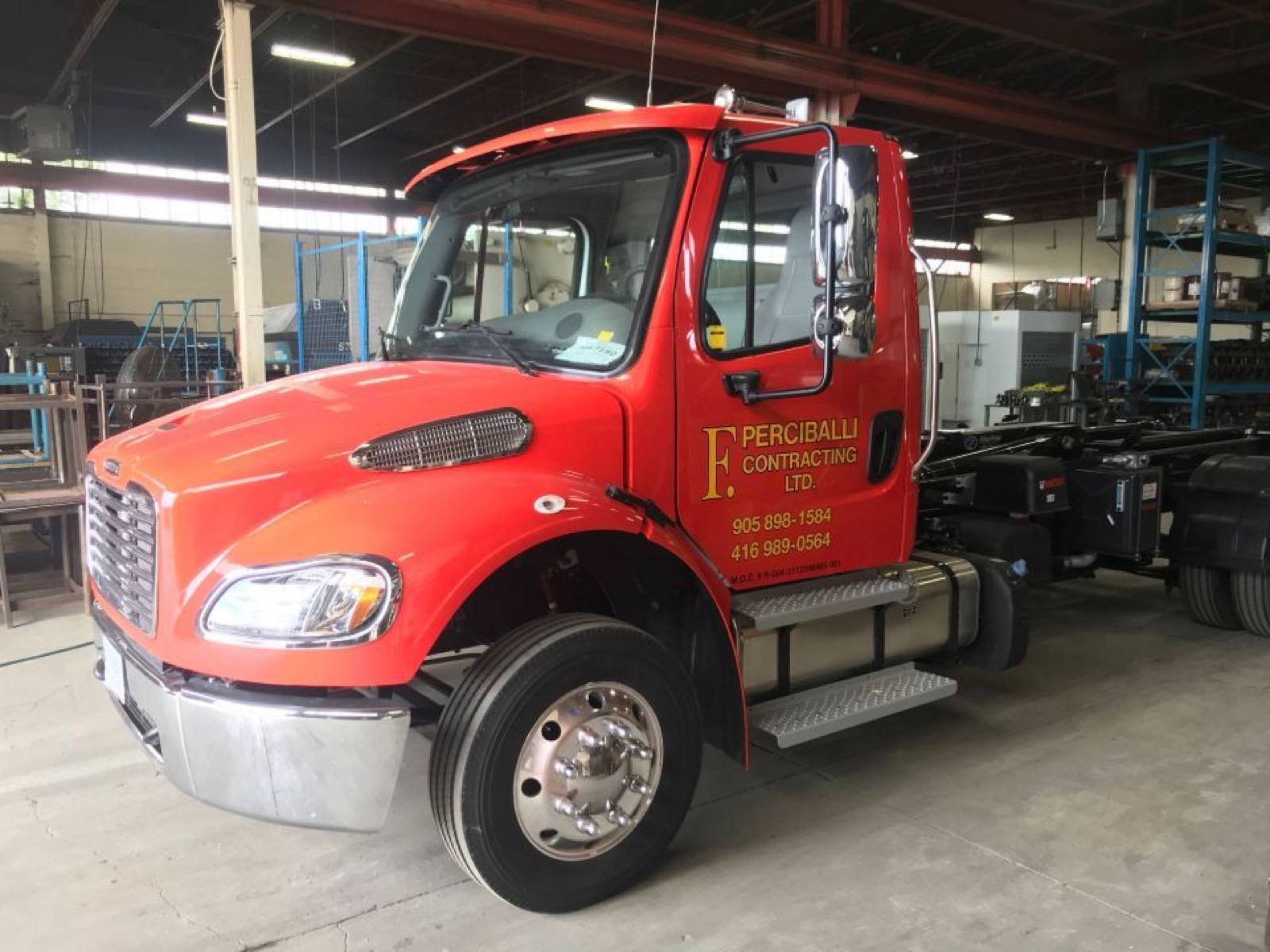 mini bin truck under garage