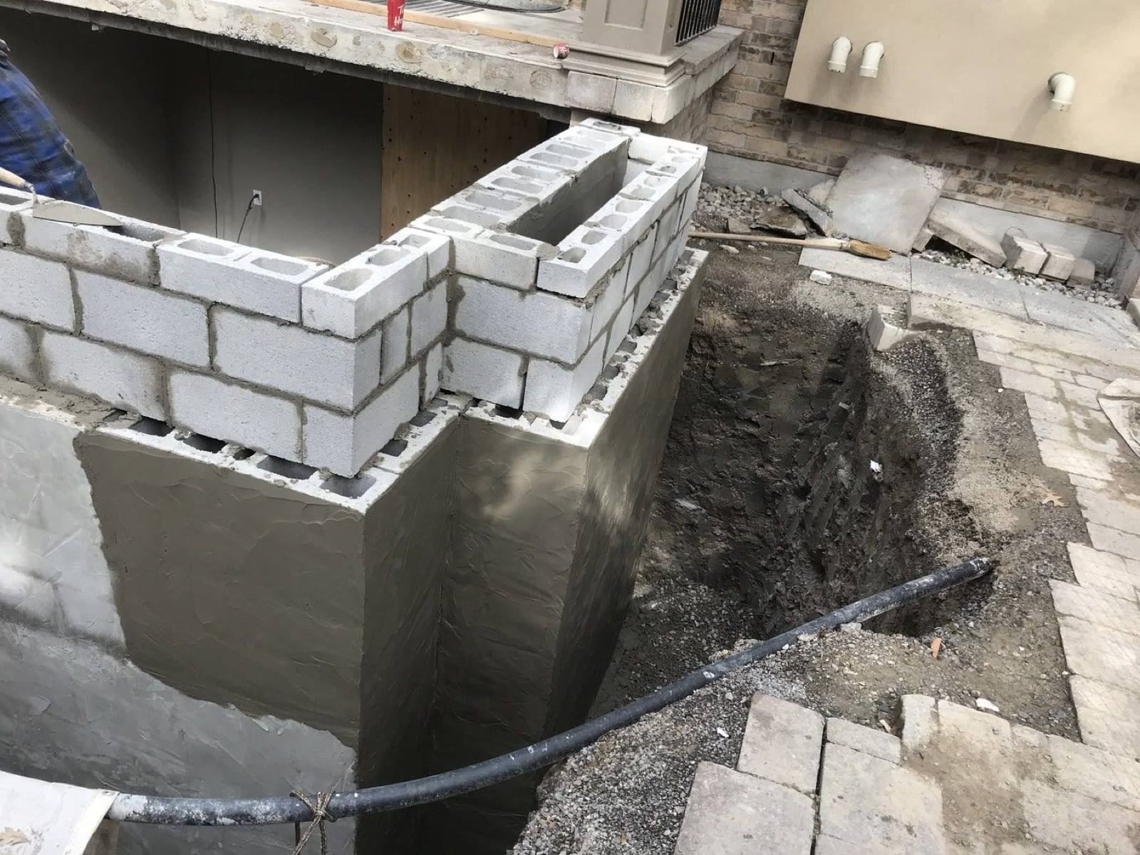 Block foundation wall under construction