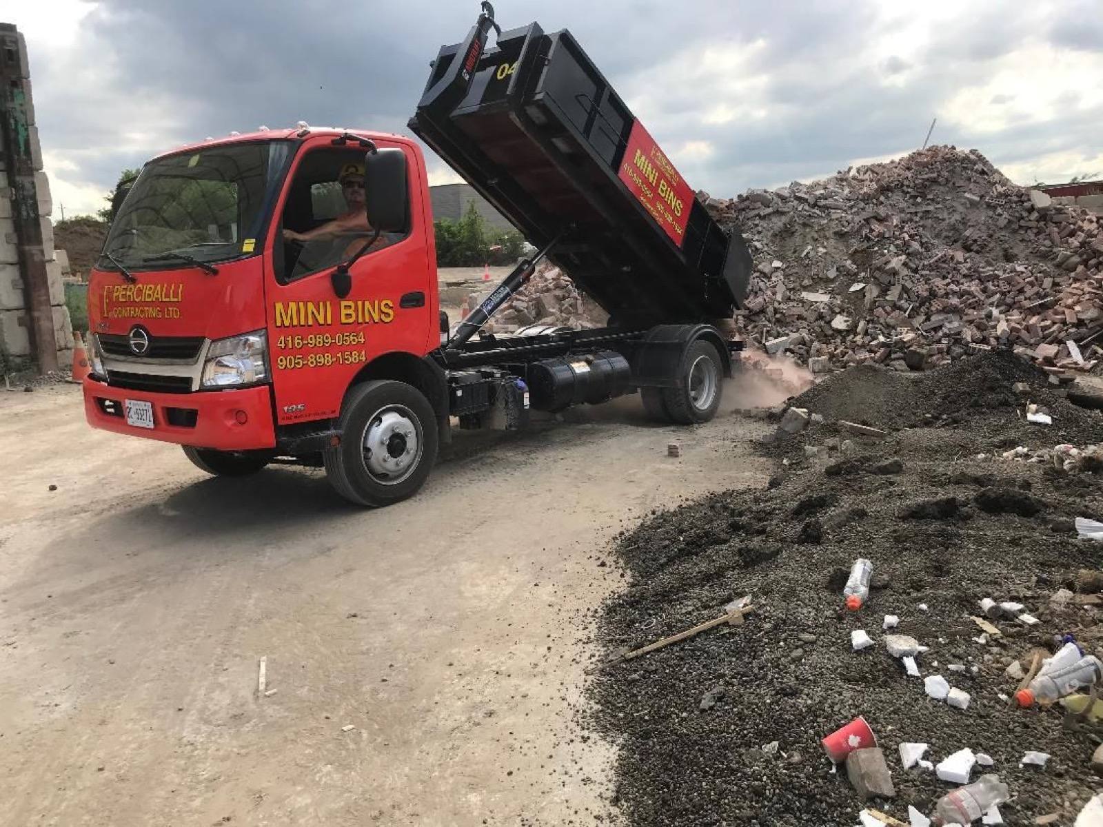 Dust bin waste being dumped 