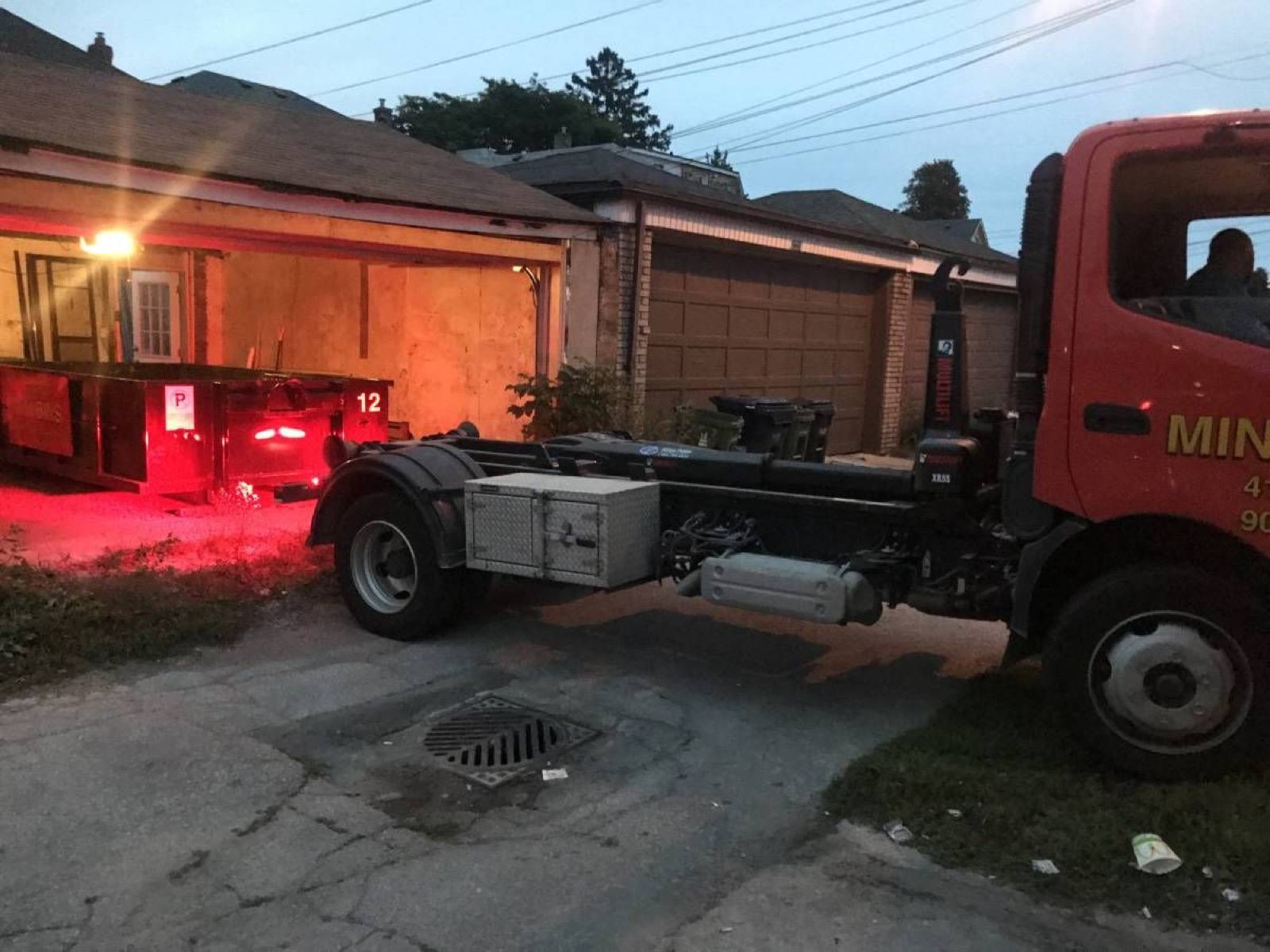 truck preparing to load the mini bin